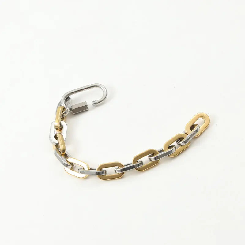 Gold-plated & stainless steel unisex chunky carabiner bracelet, featuring a stylish two-tone design.