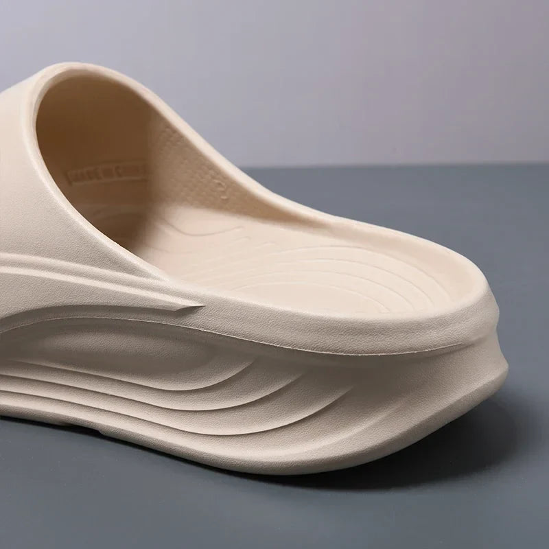 Cushioned foam slides with shock-absorbing design for all-day comfort.