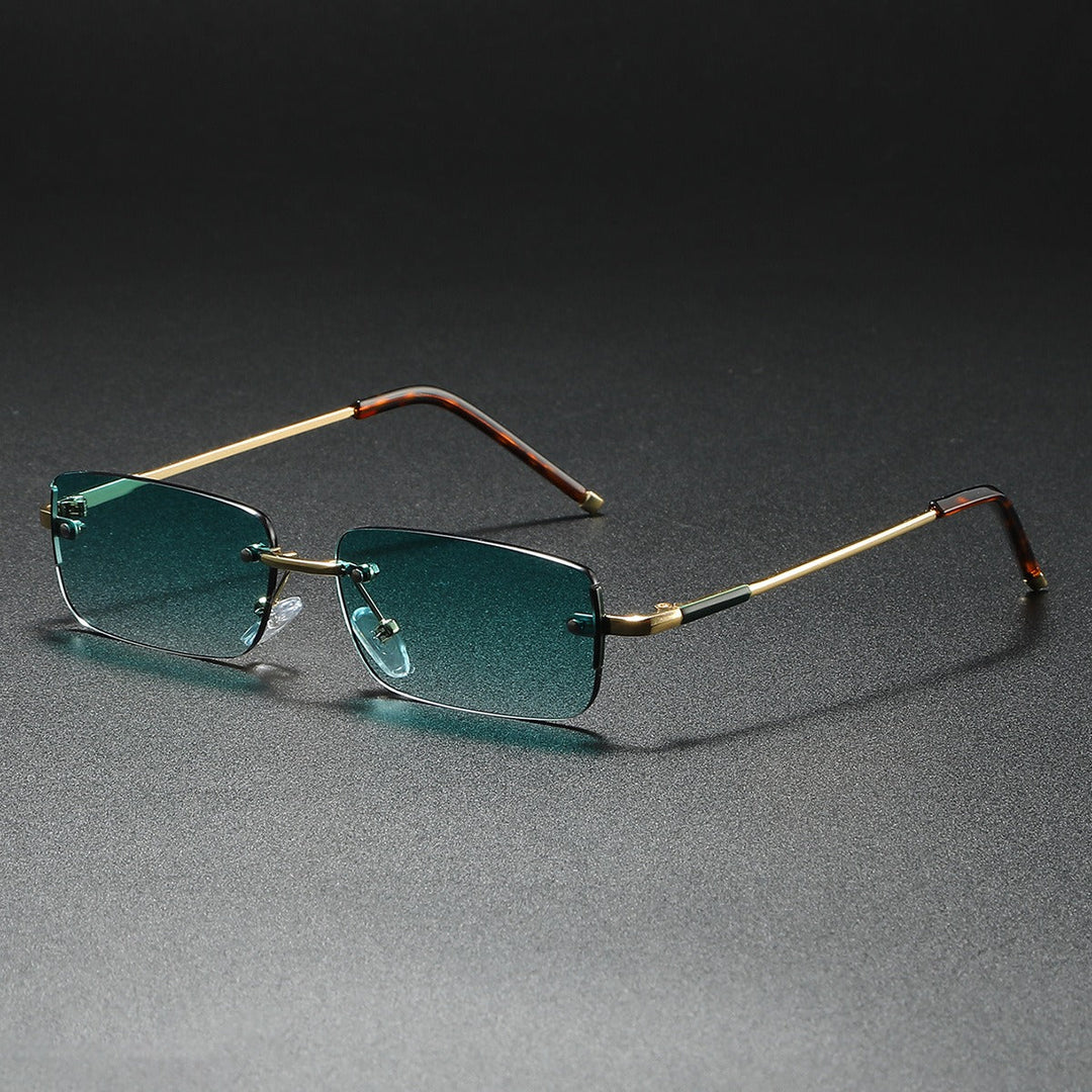 Elegant unisex rimless rectangular sunglasses with gradient lenses. Lightweight eyewear for sun protection.