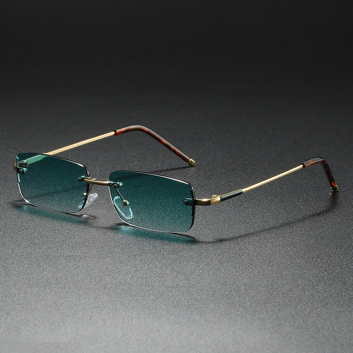 Elegant unisex rimless rectangular sunglasses with gradient lenses. Lightweight eyewear for sun protection.