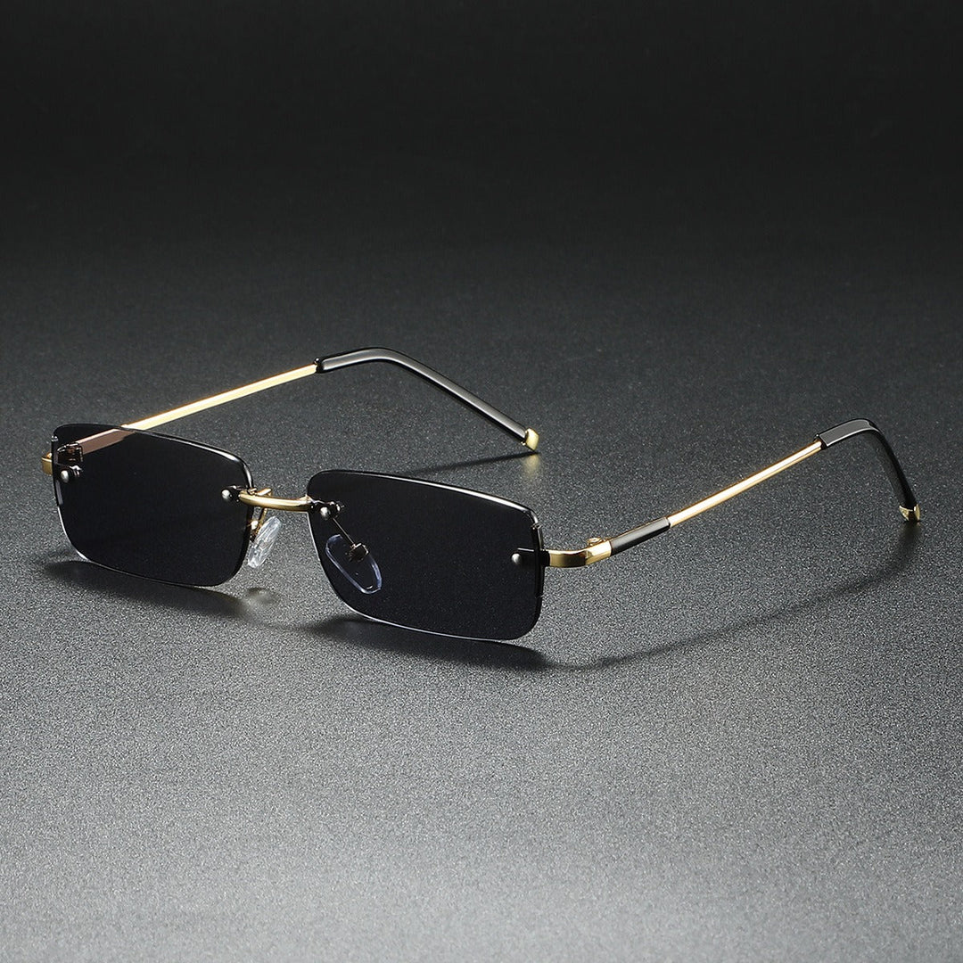 Luxury unisex ultra-light rimless rectangular sunglasses. Modern, fashionable sun protection accessory.