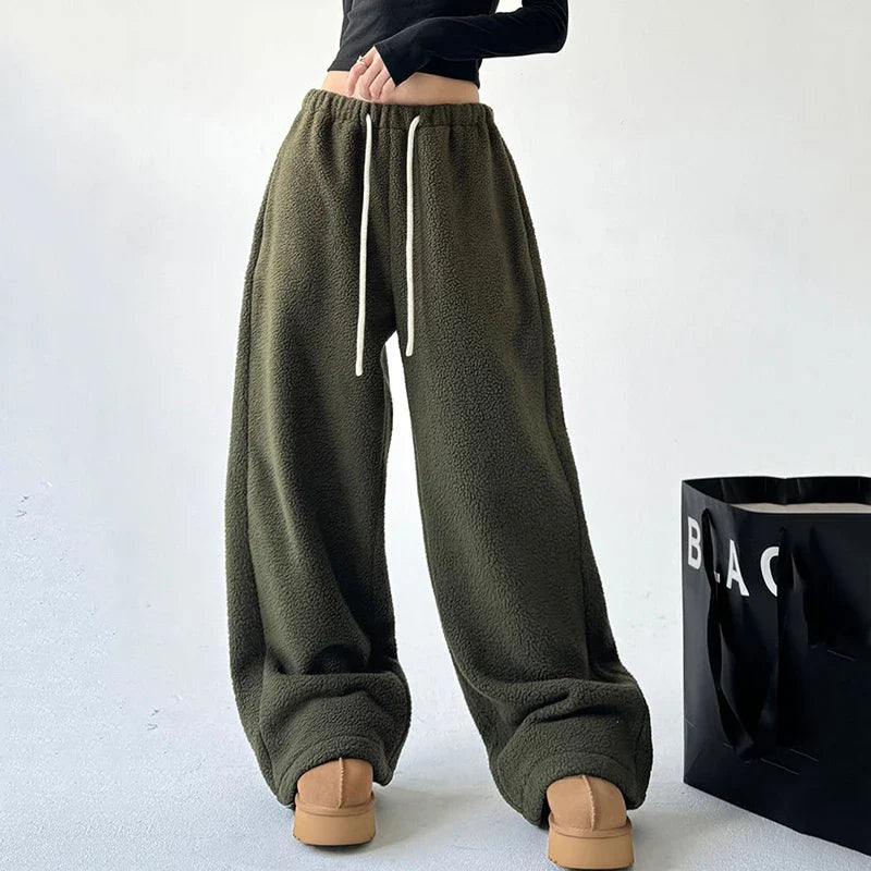 Ultra-soft unisex joggers, perfect for cozy lounging or casual everyday wear, featuring a relaxed fit & ribbed cuffs.