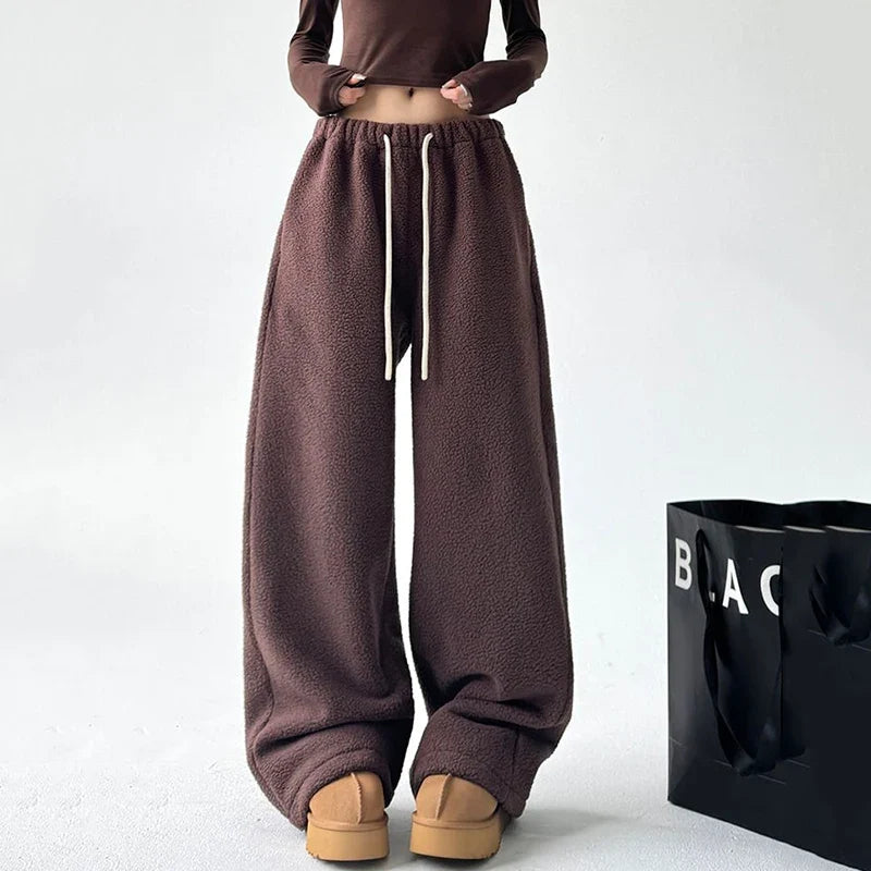 Back view of relaxed fit unisex comfort sweatpants, featuring soft material & a design for everyday casual wear.