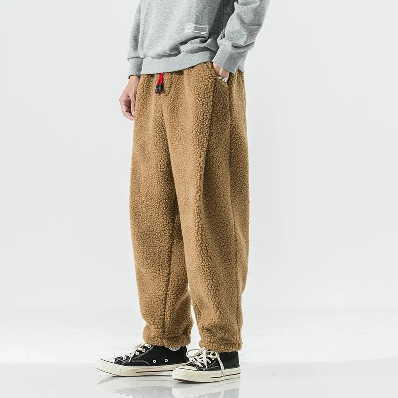 Cozy unisex sweatpants with drawstring, perfect for casual wear, lounging, or light activewear.