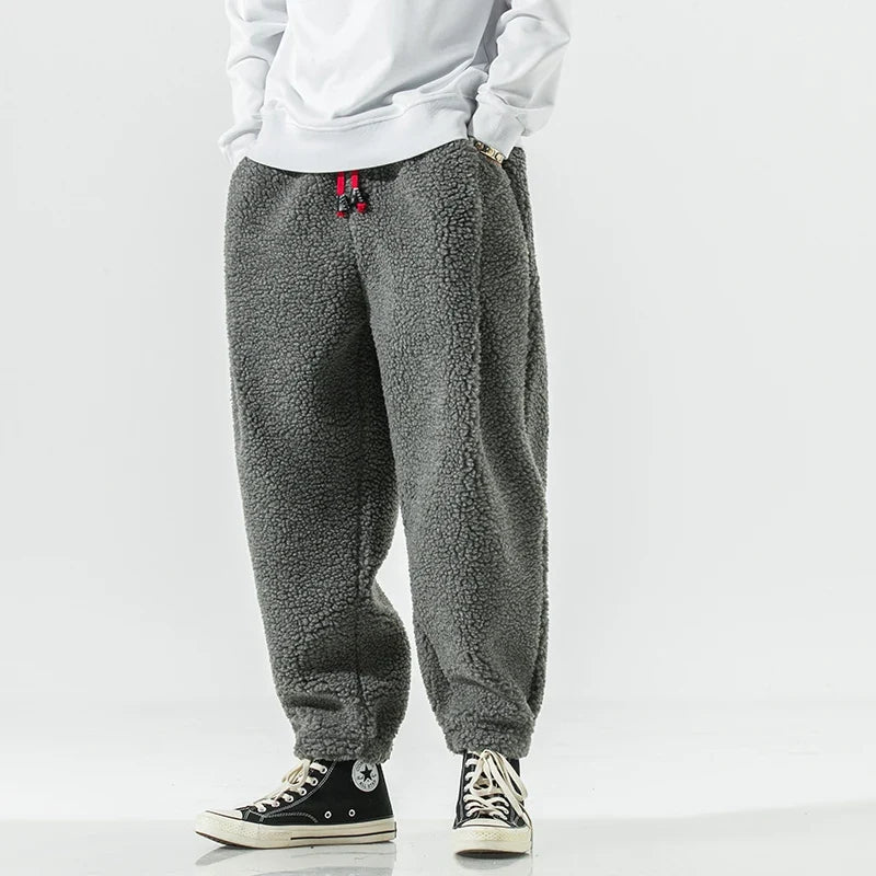 Comfortable unisex loungewear sweatpants, made from ultra-soft fabric for cozy home relaxation.