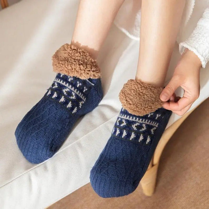 Ultra-soft non-slip unisex slipper socks, perfect for cozy indoor comfort and warmth.