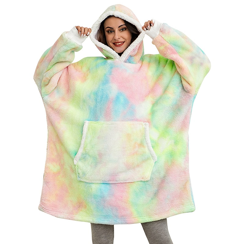 Ultra-soft grey wearable blanket hoodie, ideal for cozy evenings by the fire.