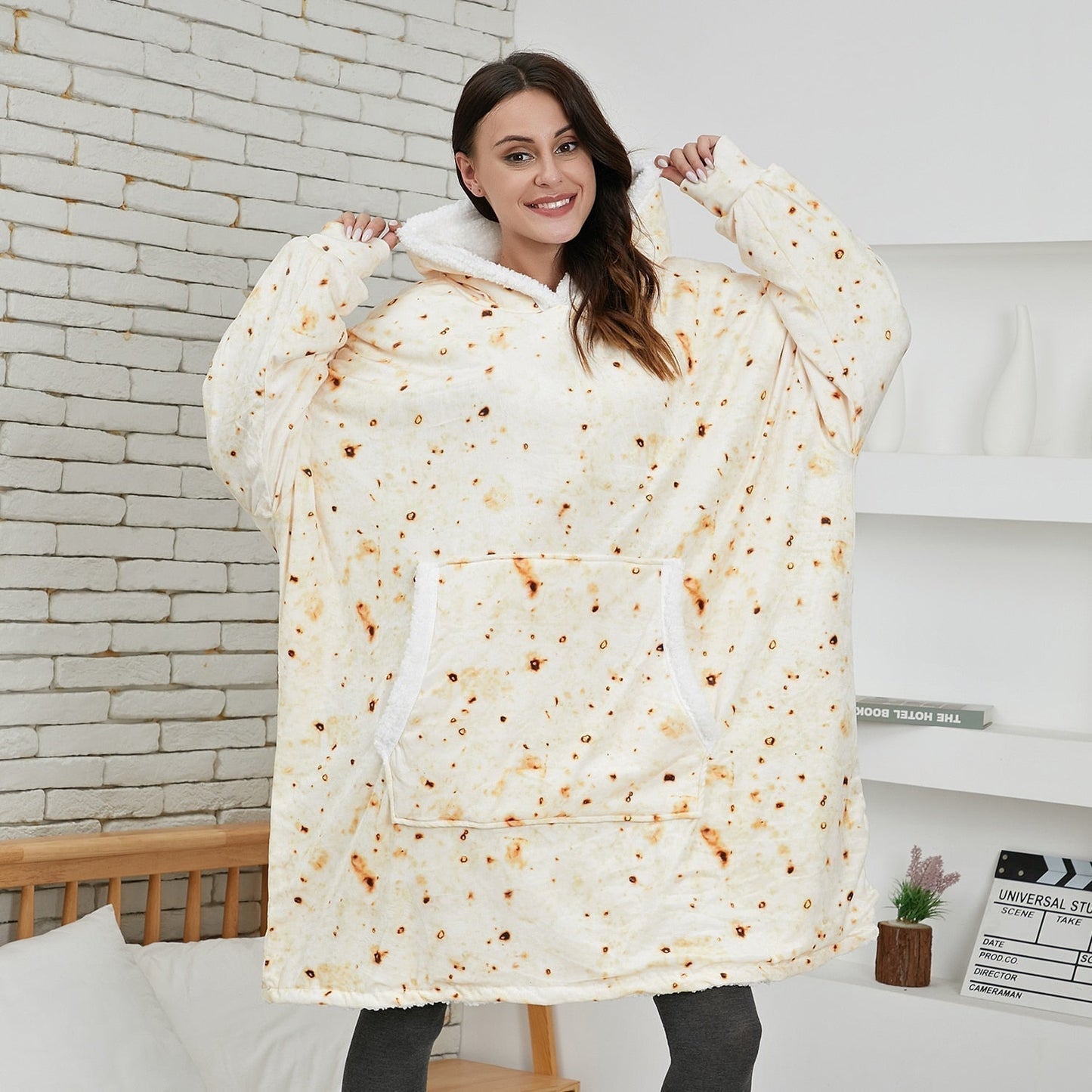 Solid color blanket hoodie, ultra-soft material for cozy lounging.