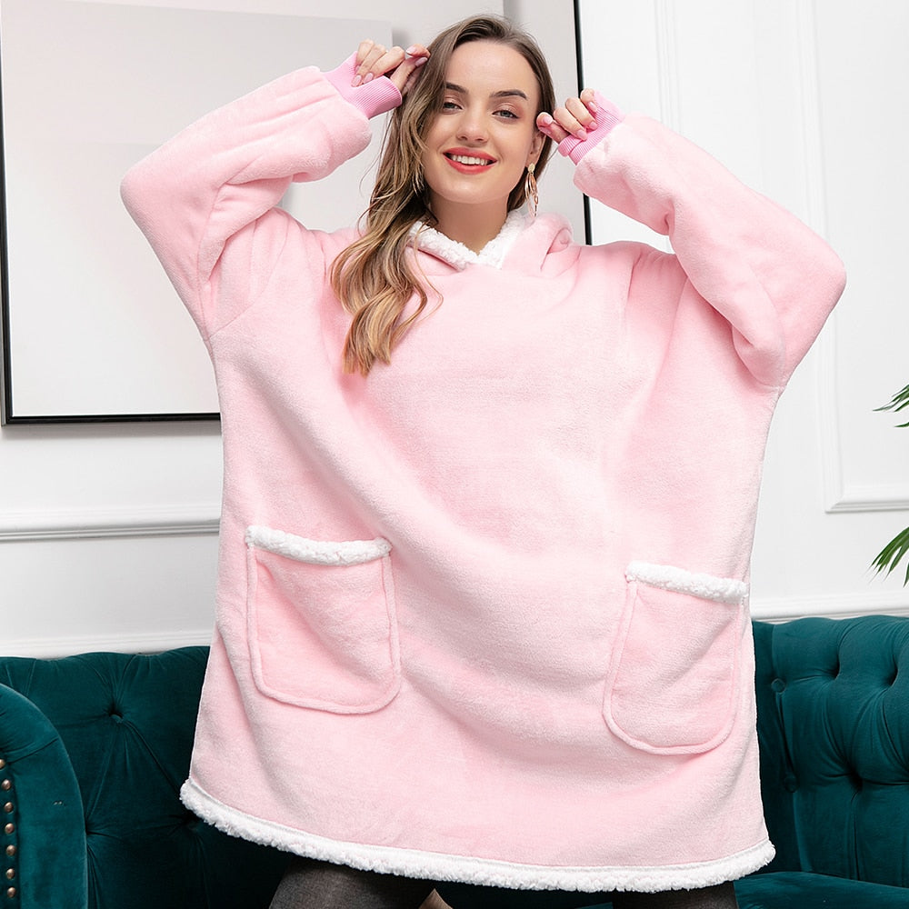 Cozy hoodie blanket, plush material for ultimate warmth and relaxation.