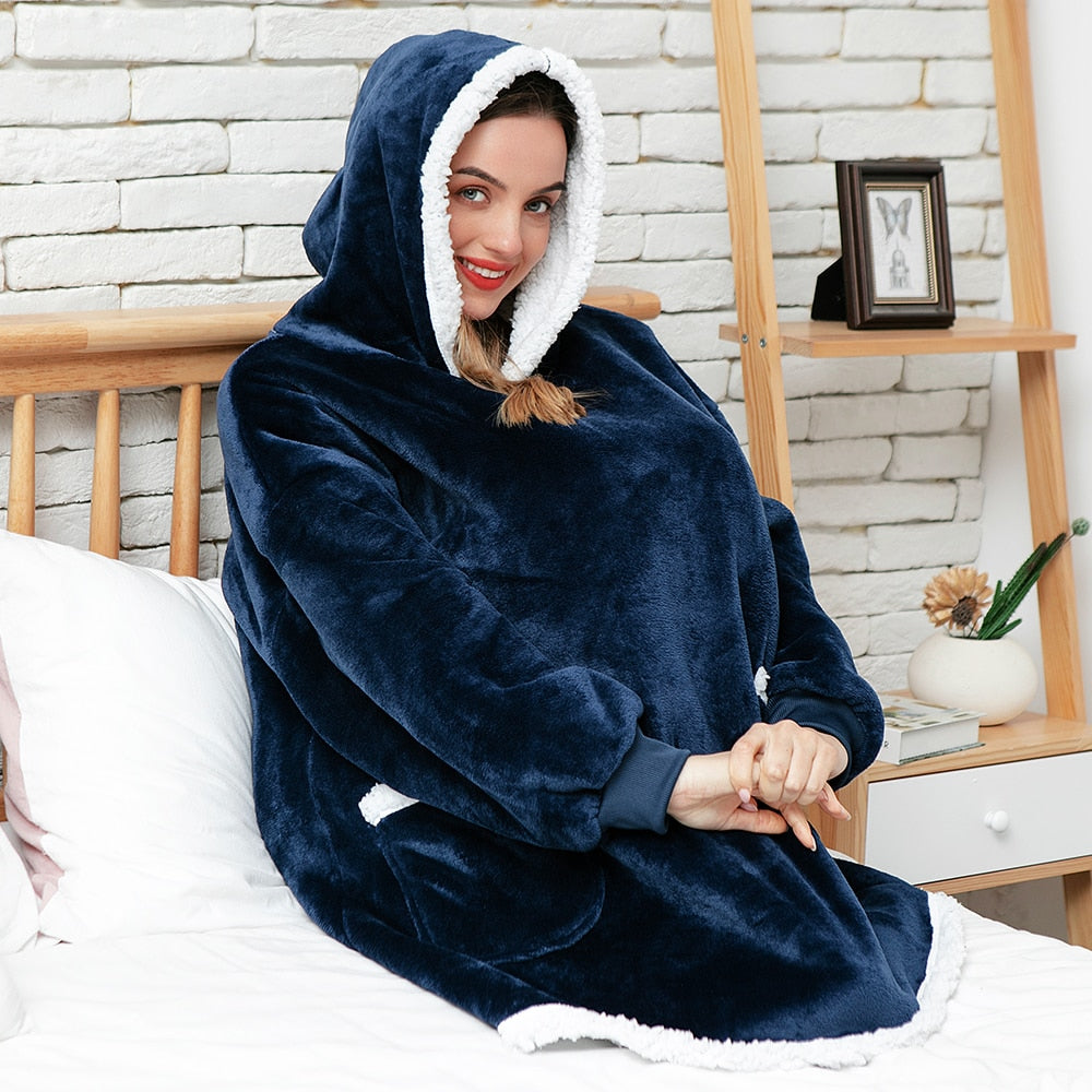 Ultra-soft Mayer hoodie blanket, ultimate comfort for relaxation.