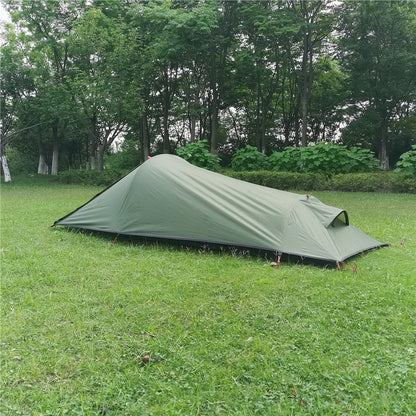 Interior view of a spacious ultralight 1-person tent with enough room for a sleeping pad & gear.