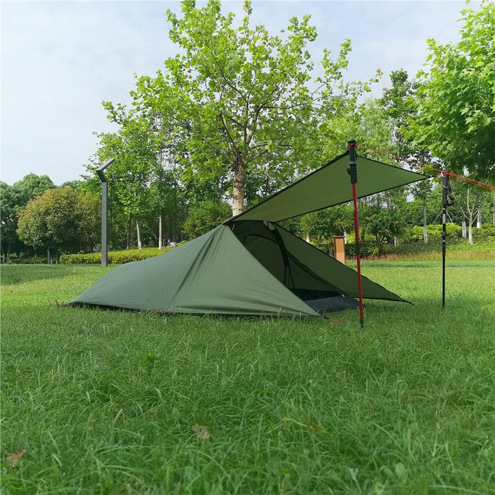 Lightweight backpacking tent stakes and poles laid out, showcasing the easy setup design for solo hikers.