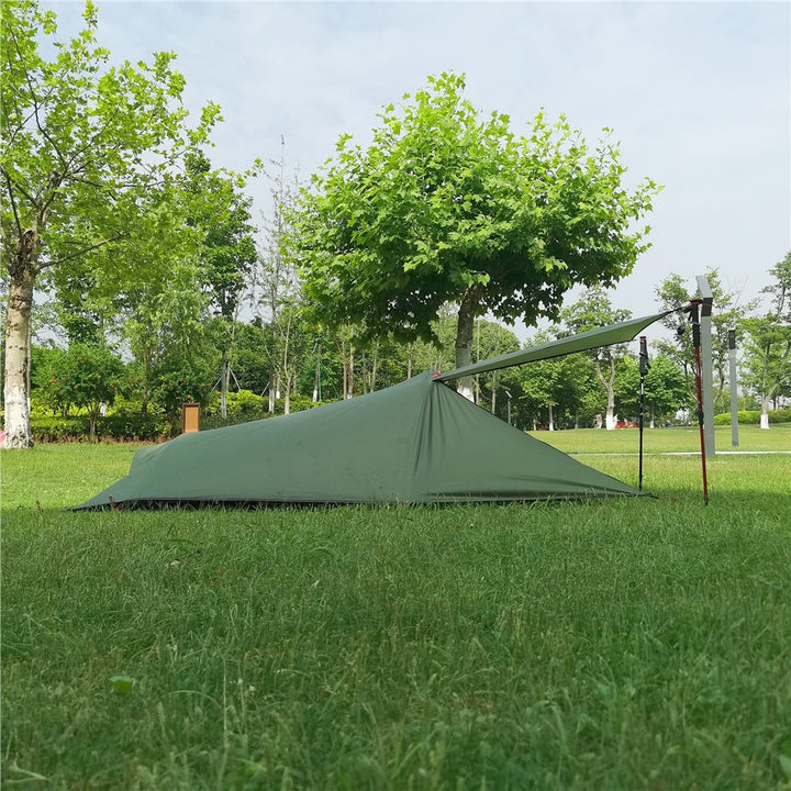 Unisex 1-person tent assembled on a rocky mountain ridge, highlighting its all-season durability.