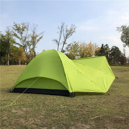 Camping tent packed in a carry bag, portable ultralight 3-person shelter