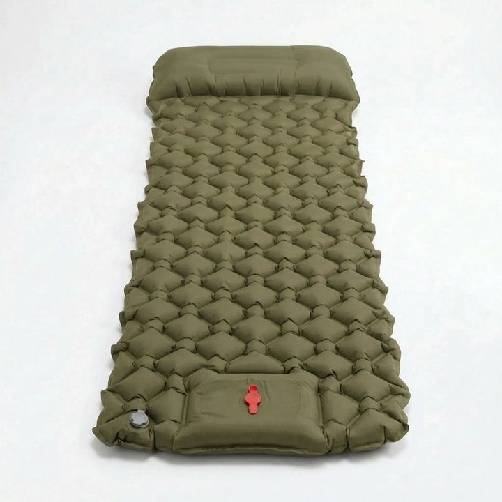 Rolled & packed ultralight sleeping pad, ready for travel. Foot pump ensures easy inflation for camp comfort.