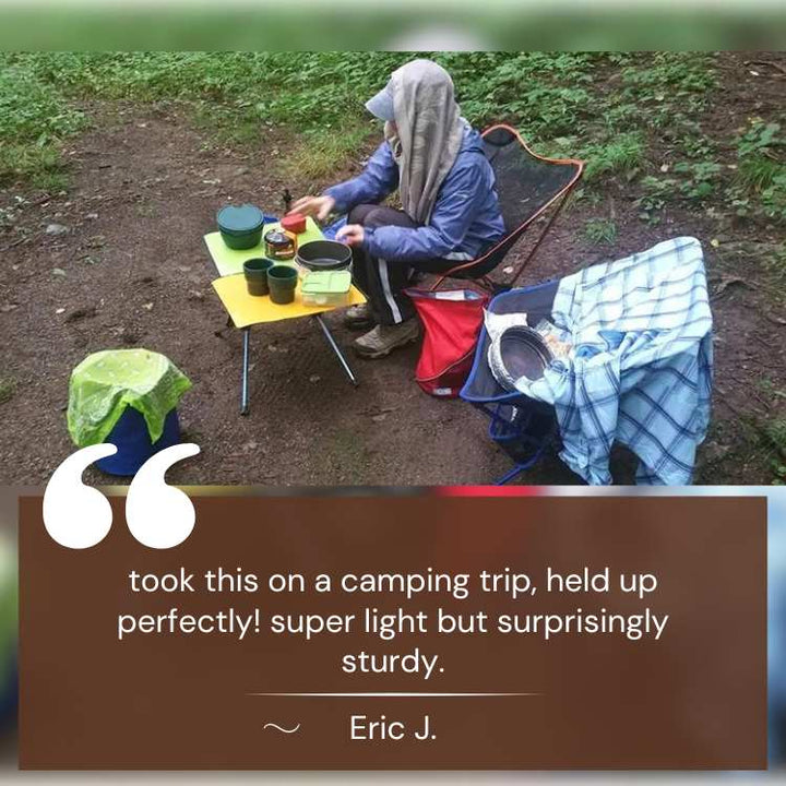 Unisex ultralight portable folding camp chair packed in its bag next to a backpack, indicating its travel-friendly nature.