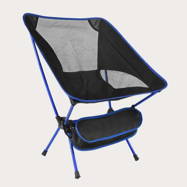 Detail of the durable fabric and aluminum frame of an ultralight portable folding camp chair, robust for camping.