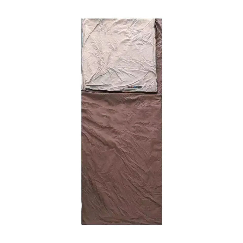 Unisex ultralight sleeping bag, compressed in a stuff sack, highlighting portability