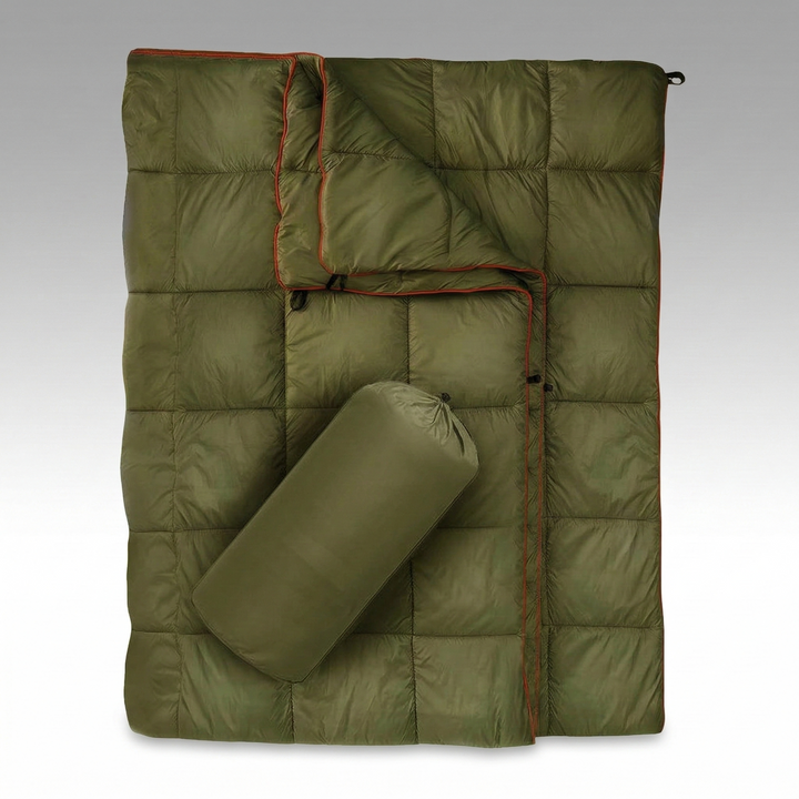 Unisex ultralight water-resistant wearable camping blanket, open on a tent.