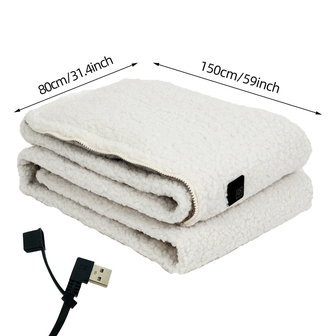 Comfortable USB heated throw blanket in a home setting, providing portable warmth for any activity.