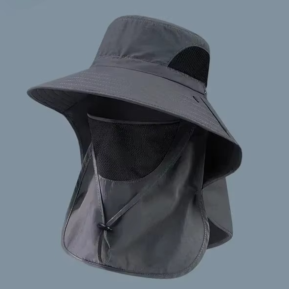Durable quick-dry outdoor hat with UV protection, wide brim, and secure neck flap for travel gear.