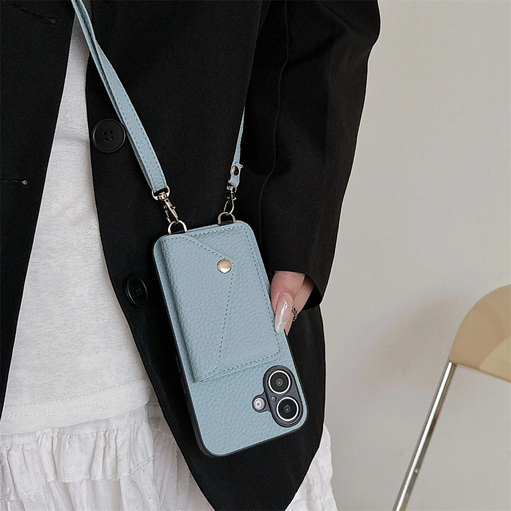iPhone lanyard wallet case in vegan leather. Perfect for hands-free use, protecting phone & carrying cards.
