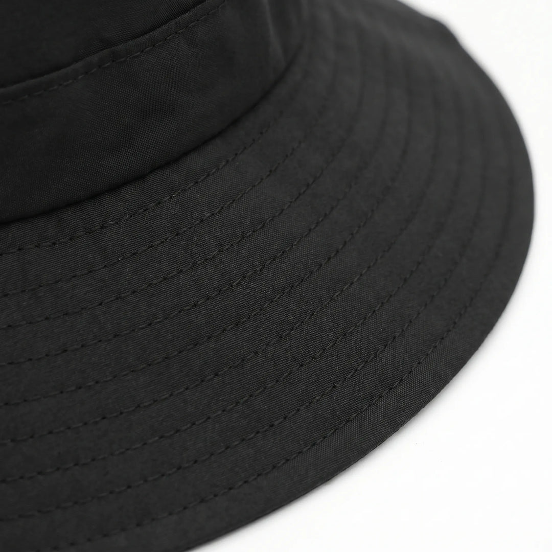 Adventure-ready unisex surf hat with wide brim & ventilation for ultimate sun protection & comfort.