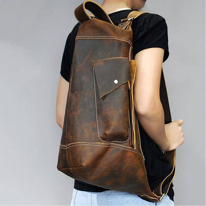 Unisex vintage crazy horse leather traveler backpack, rich brown, main view with straps and buckles, for travel & daily use