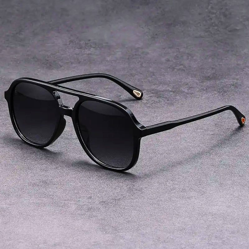Unisex vintage eyewear with UV400 protection & gradient lenses. Fashionable eye protection for men & women.