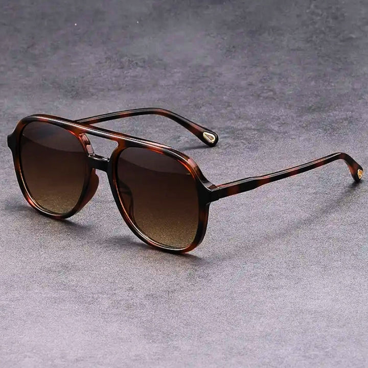 Retro-inspired unisex sunglasses offering full UV400 eye protection. Vintage style with modern sun safety.