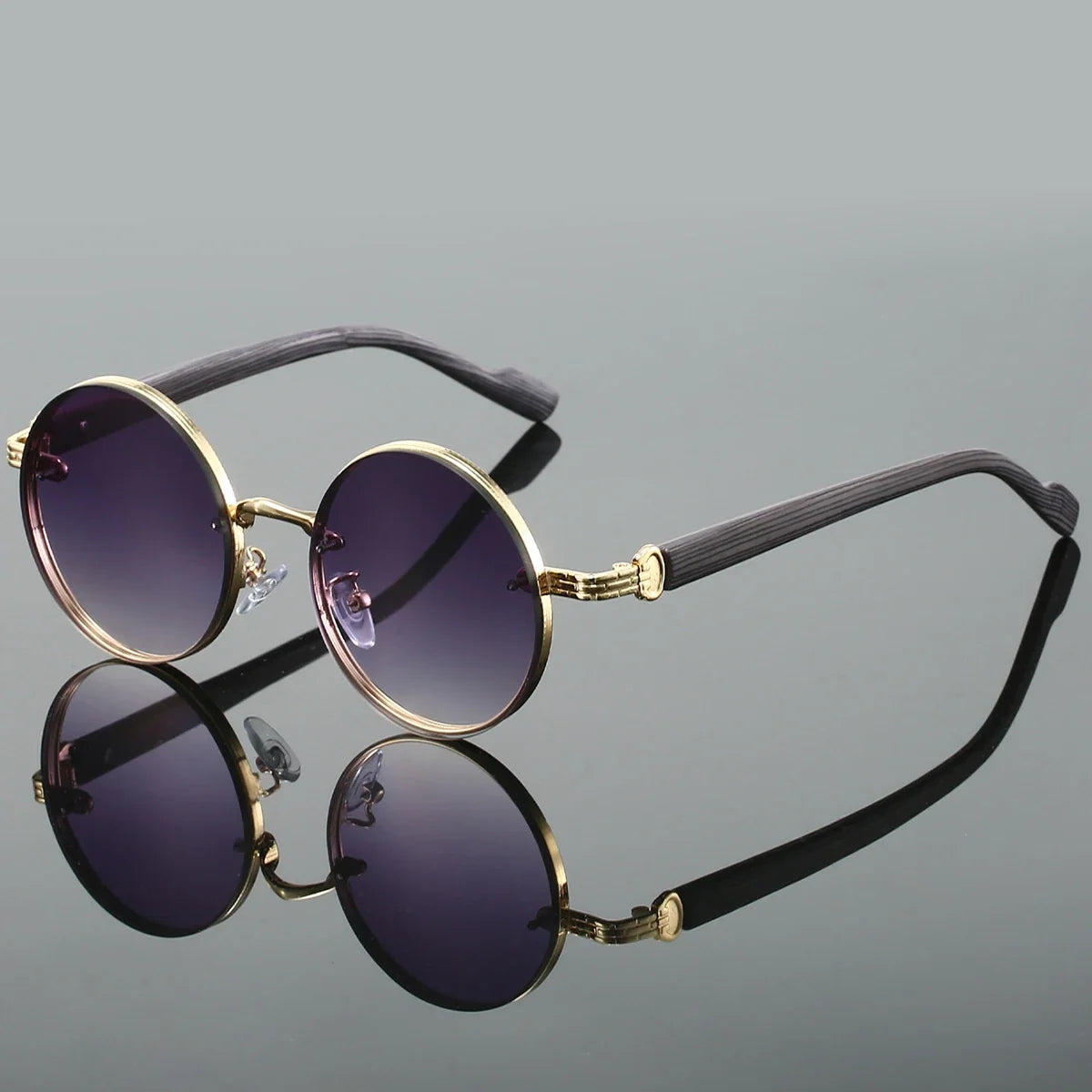 Stylish unisex round eyewear. Vintage design with essential UV protection against sun glare.