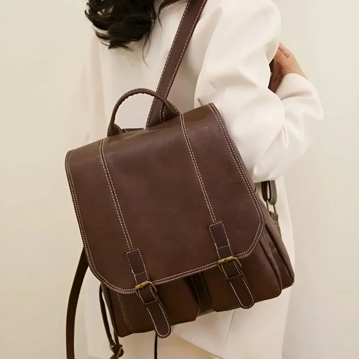 Durable unisex vintage style backpack for laptops. Classic design, perfect for school, work, or travel.