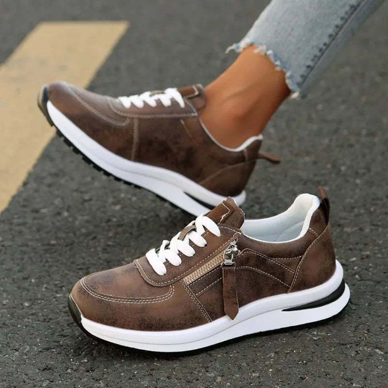Unisex vintage style runners with comfort cushioning, lace-up design & distressed finish for everyday wear.