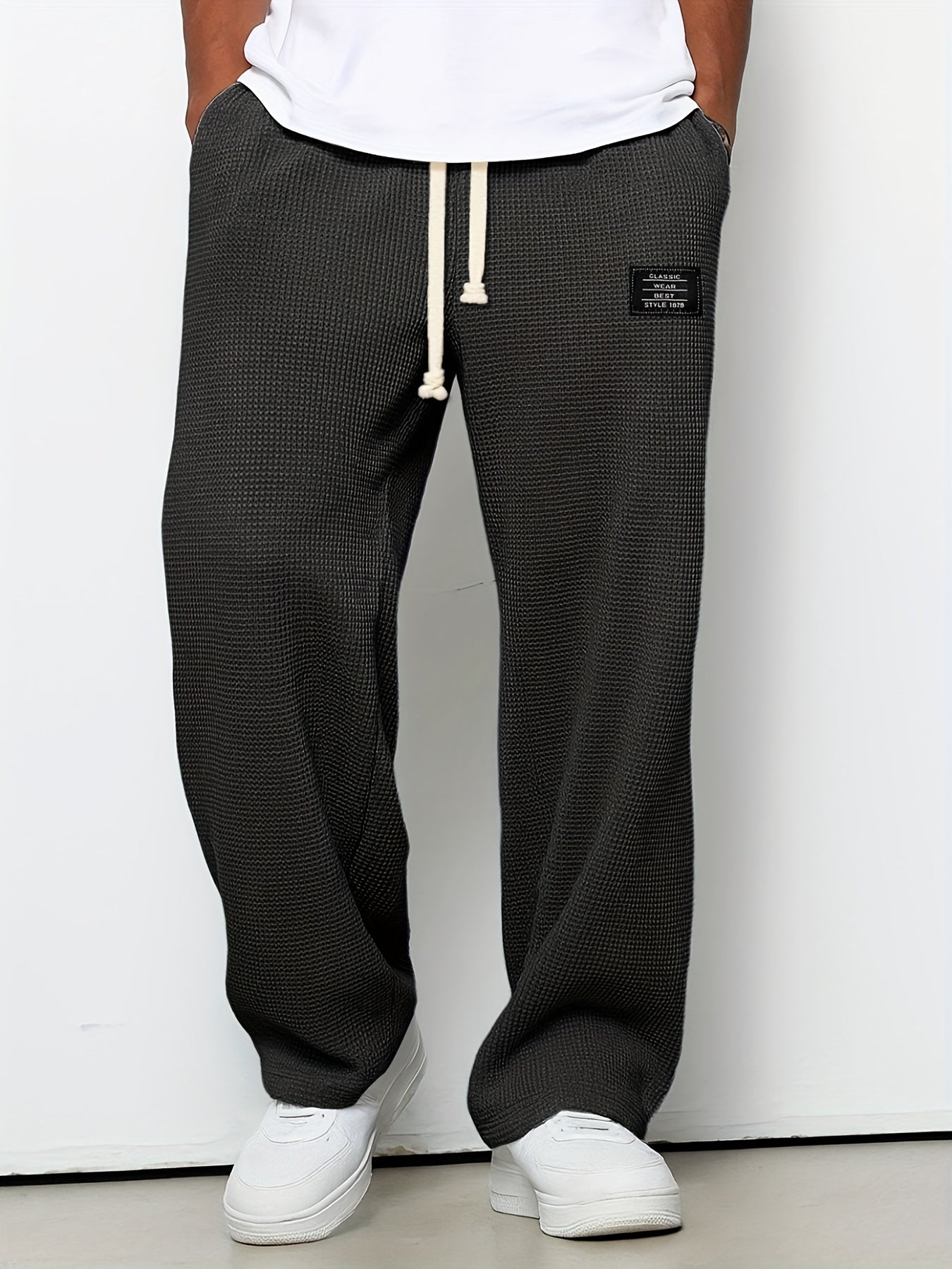 Relaxed fit unisex waffle knit pants. Soft, wide-leg lounge pants, perfect for ultimate comfort.