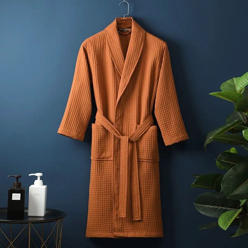 Model in a comfortable unisex waffle bathrobe, relaxing, perfect loungewear.
