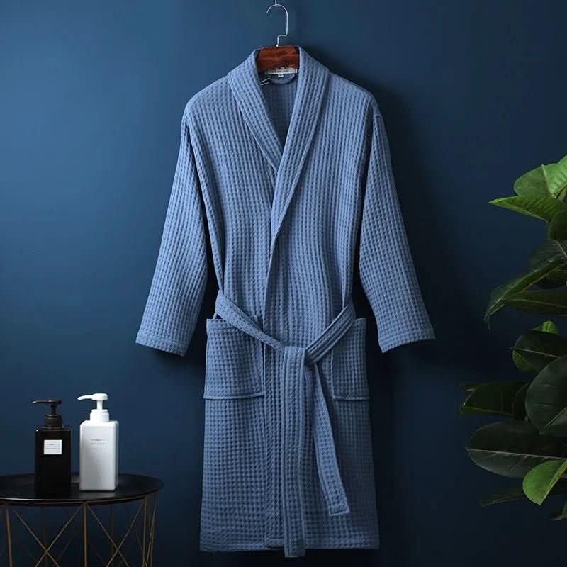 Folded unisex waffle textured spa robe, ready for ultimate comfort.