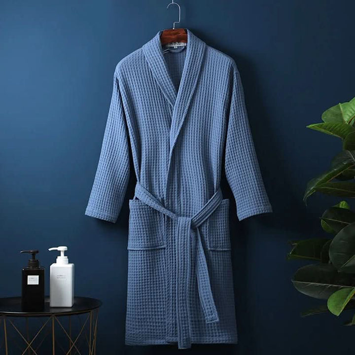 Folded unisex waffle textured spa robe, ready for ultimate comfort.
