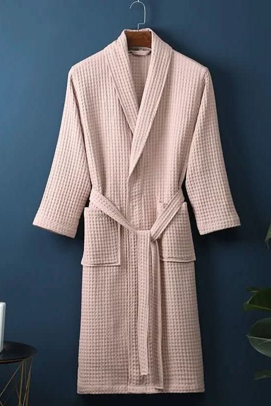 Relaxed fit unisex waffle bathrobe, lightweight and breathable loungewear.