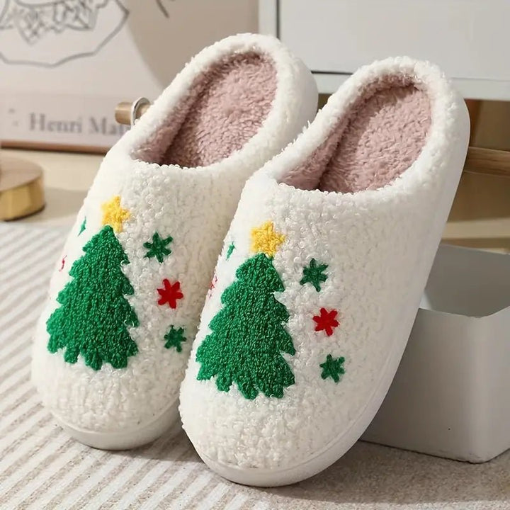 Soft, warm house slippers with a cheerful deer pattern, providing non-slip comfort at home.