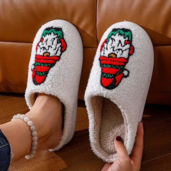 Holiday-themed unisex slippers with a detailed deer motif, great for cozy winter evenings.