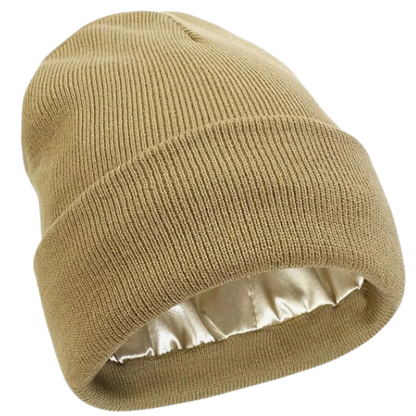 Versatile black knit beanie, satin-lined, providing warmth & frizz-free hair protection for winter.
