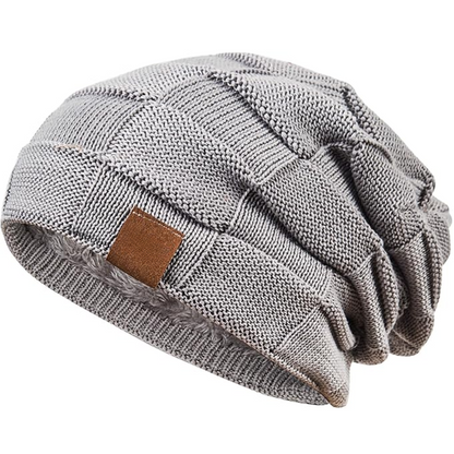 Yves warm knitted beanie hat, essential unisex winter headwear.