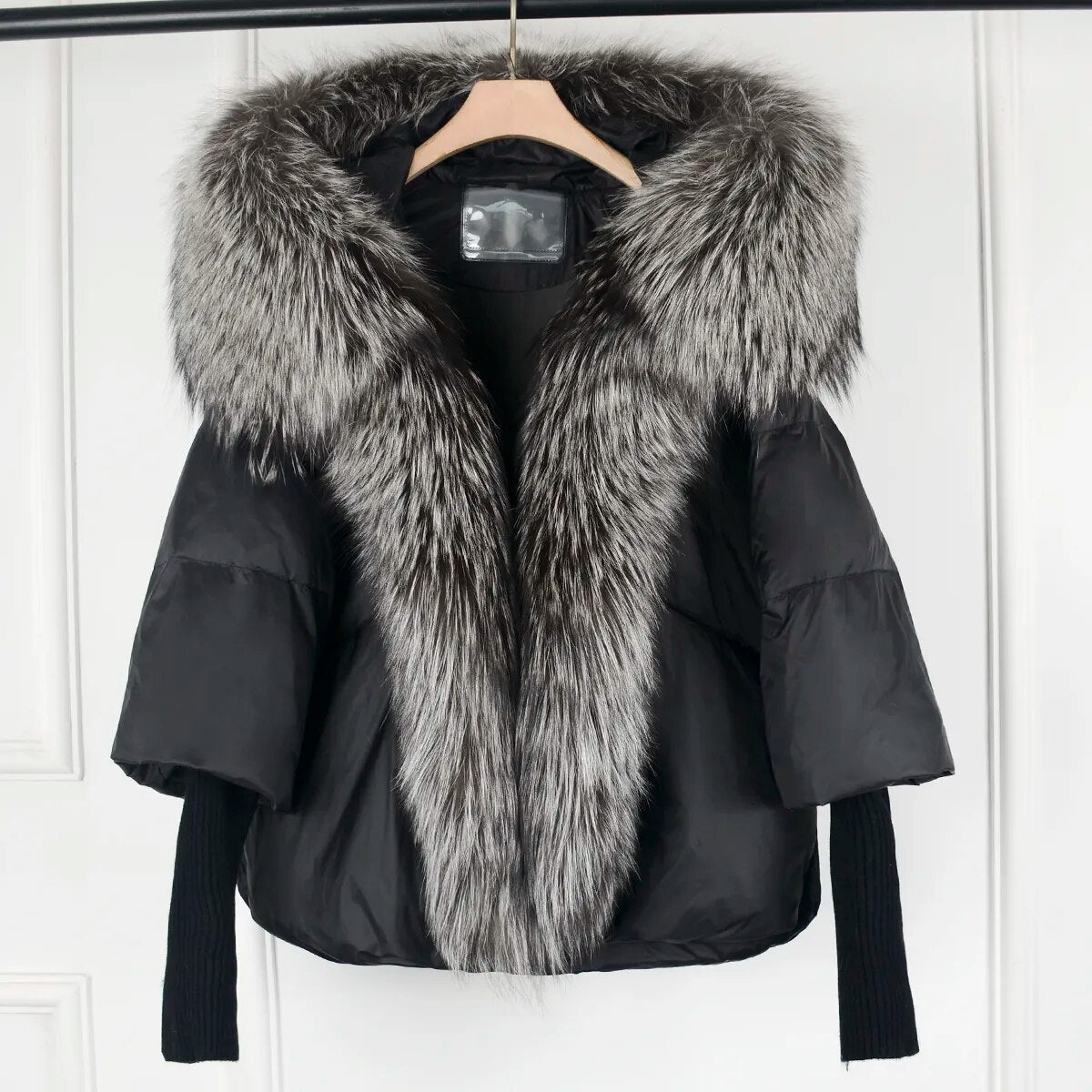 Stylish model wearing a unisex puffer jacket, ideal lightweight outerwear for fall fashion & everyday wear.