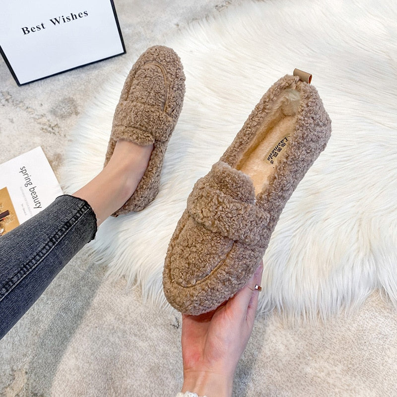 Plush soft unisex winter slippers, offering ultimate comfort and warmth for indoor wear.