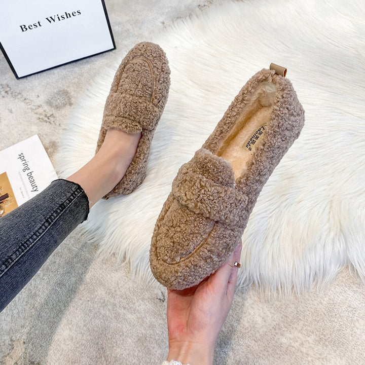 Plush soft unisex winter slippers, offering ultimate comfort and warmth for indoor wear.