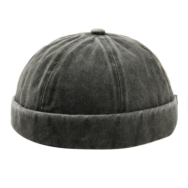 Unisex washed brimless cap with rolled cuff for casual street style.