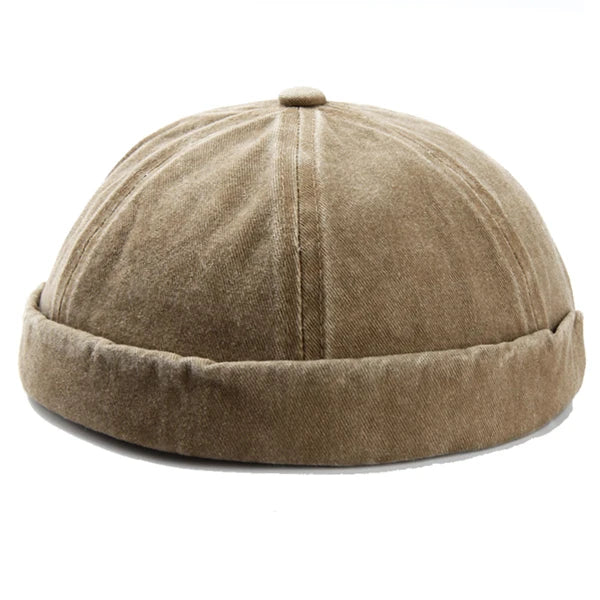 Smoke green washed brimless cap with rolled cuff, a stylish unisex street style accessory.