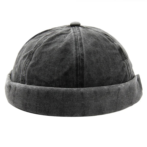 Khaki washed cotton brimless hat with rolled cuff, perfect casual headwear for all.