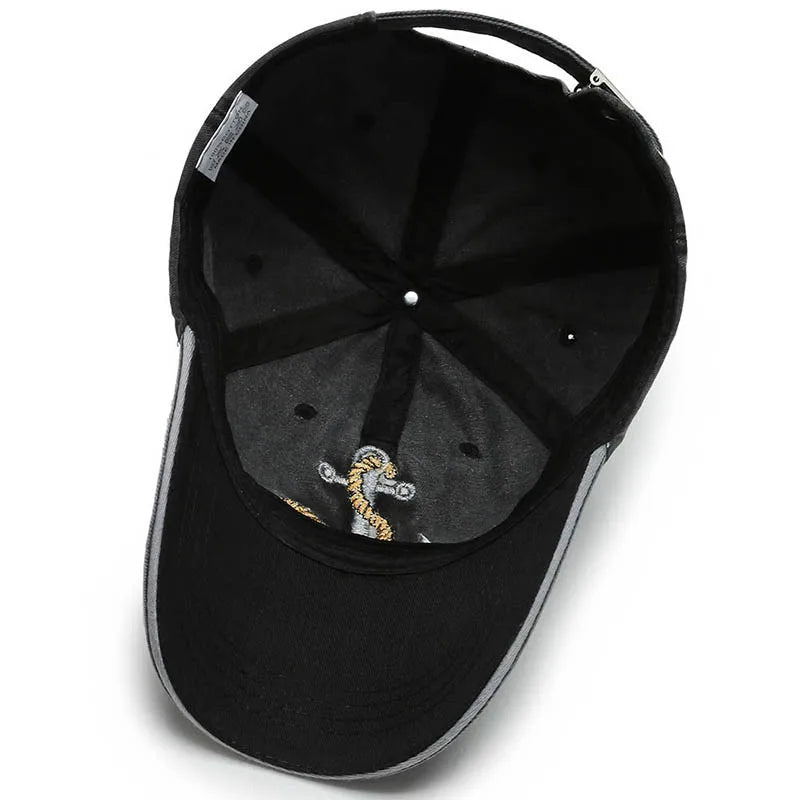 Adjustable washed baseball cap, unisex, perfect for casual outings, showcasing an embroidered anchor.