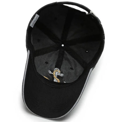Adjustable washed baseball cap, unisex, perfect for casual outings, showcasing an embroidered anchor.